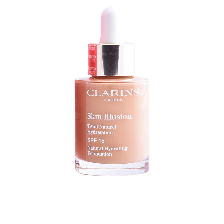 Frasco del tono 113 en presentación de 30 ml del maquillaje Skin Illusion Teint Naturel Hydratation de Clarins; se aprecia el envase translúcido con dosificador y etiqueta clara que indica el número de tono 113 y el volumen 30 ml.