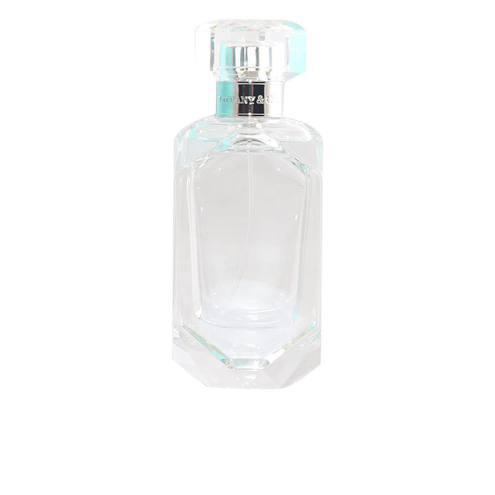 50 ml clear glass perfume bottle with pale floral eau, minimalist cap