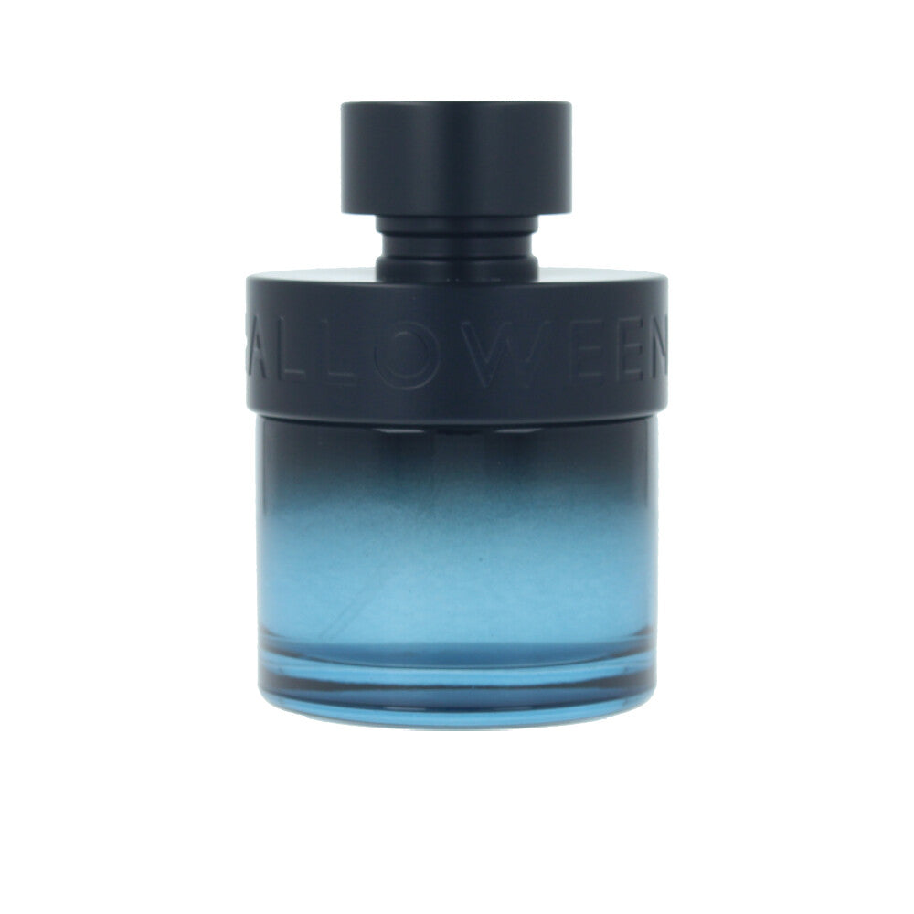 Cylindrical glass perfume bottle, 75 ml, amber liquid, citrus-spice label