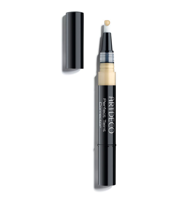 1.80 ml fluid concealer in shade 60 light olive with integrated brush applicator