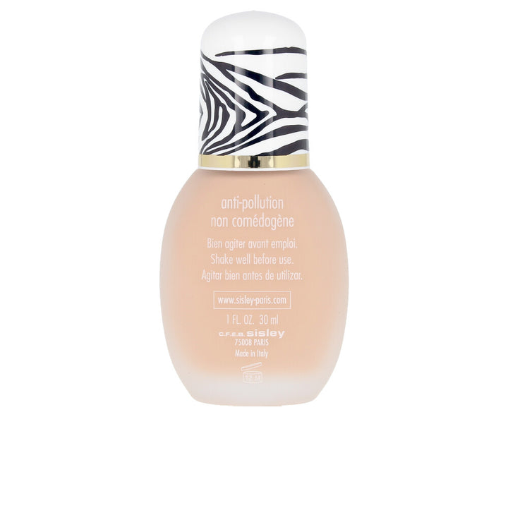 30 ml cosmetic bottle of lightweight tinted fluid — medium shade, pump top
