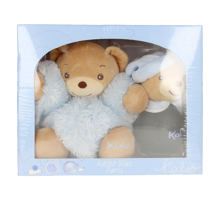 Rounded translucent glass fragrance bottle with teddy-head cap and matching plush bear