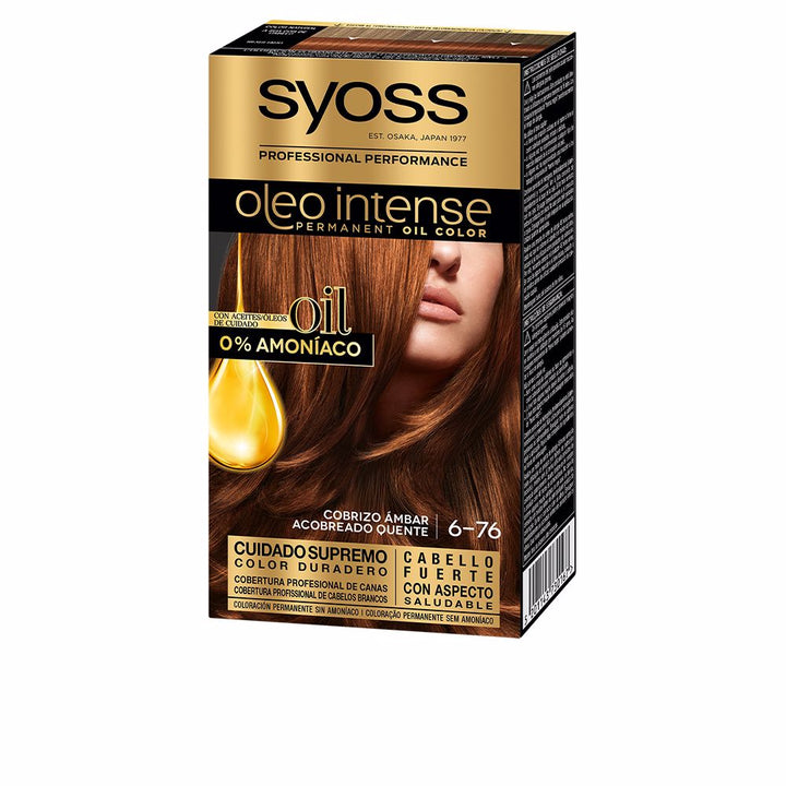 Tube of dark brown permanent cream hair colour with applicator cap for Women