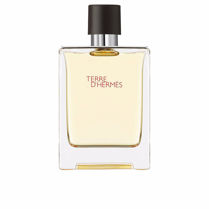 Rectangular glass bottle with metal shoulders; 100 ml woody-citrus perfume for Man
