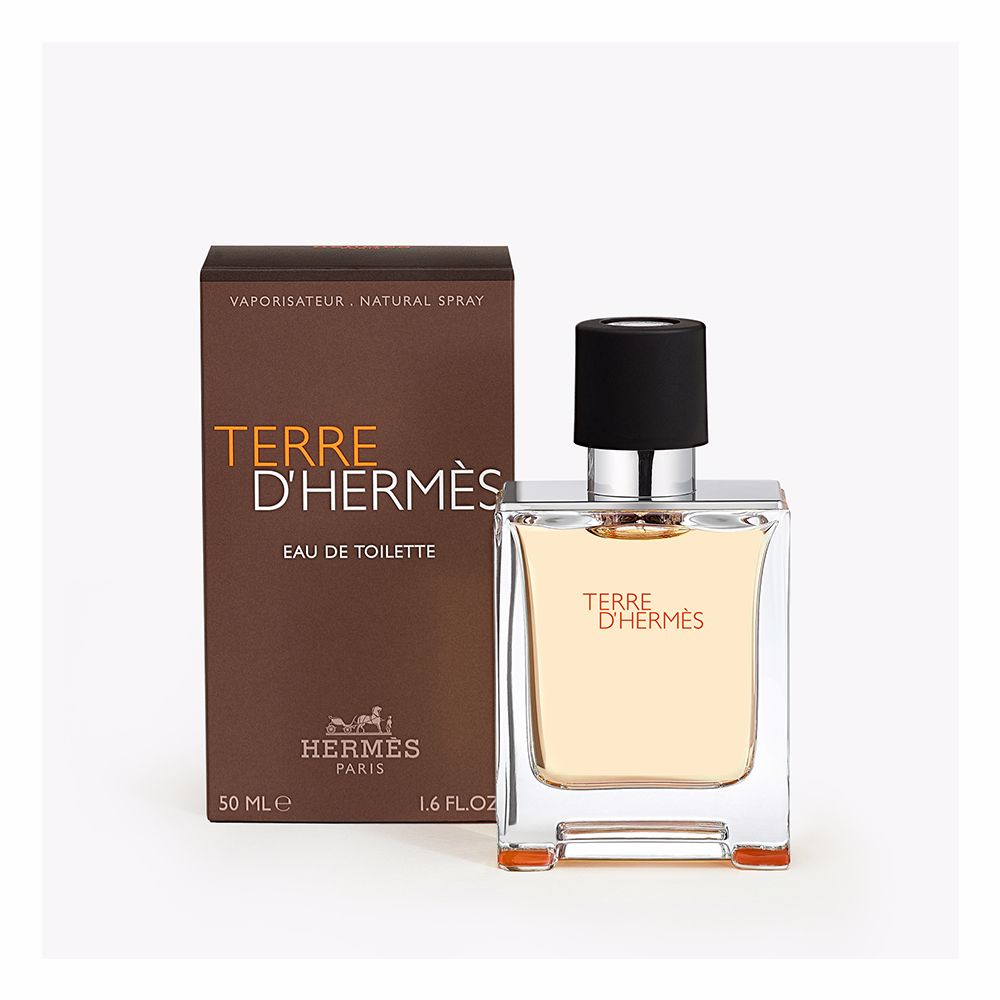 Rectangular glass bottle with metal shoulders; 100 ml woody-citrus perfume for Man