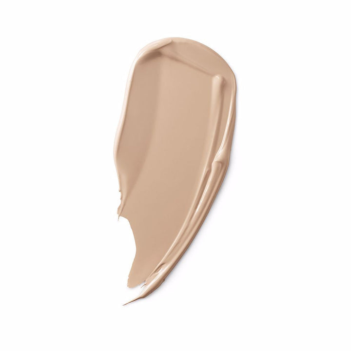 Compact tube concealer with tear-shaped applicator, creamy finish, 1 unit