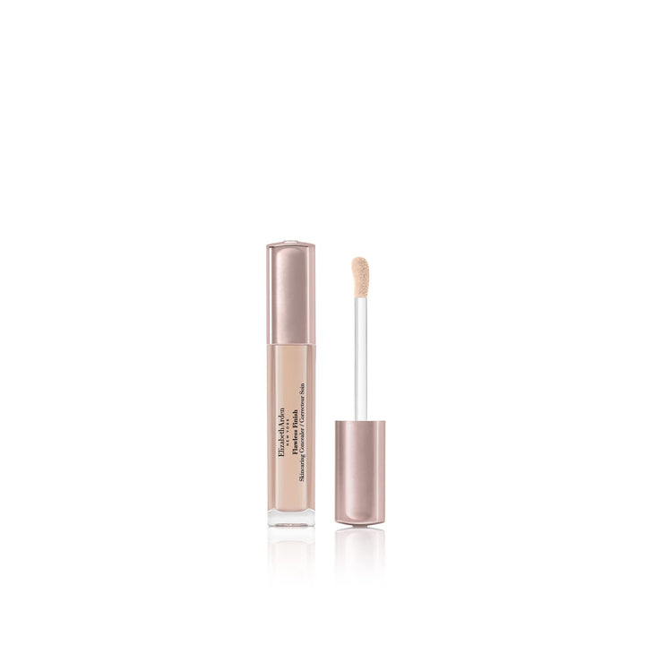 Compact concealer tube with teardrop applicator, creamy beige shade
