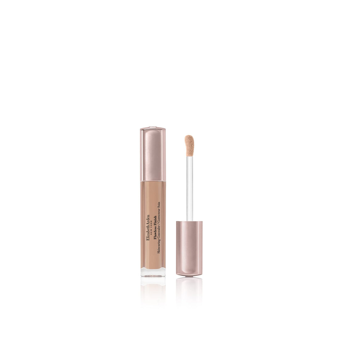 Compact concealer tube with tear‑shaped applicator; creamy light shade