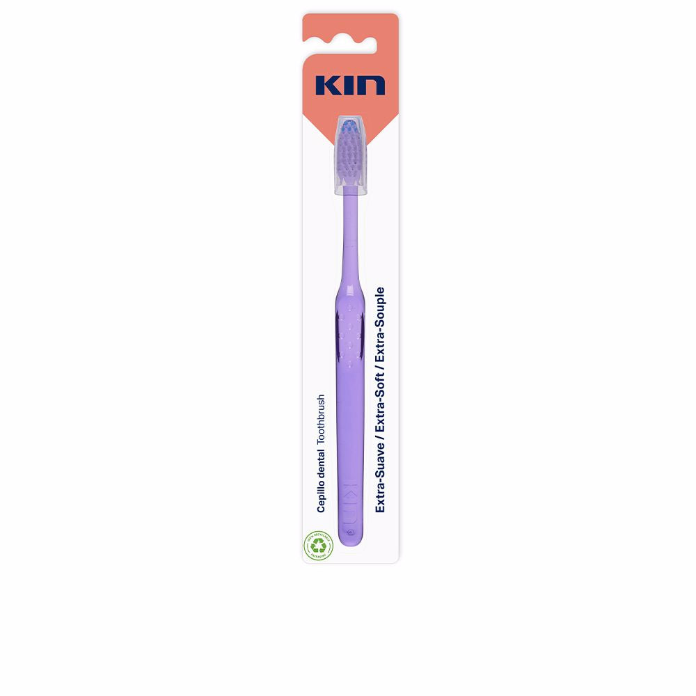 Compact triangular-head toothbrush with ergonomic non-slip handle and protective cap