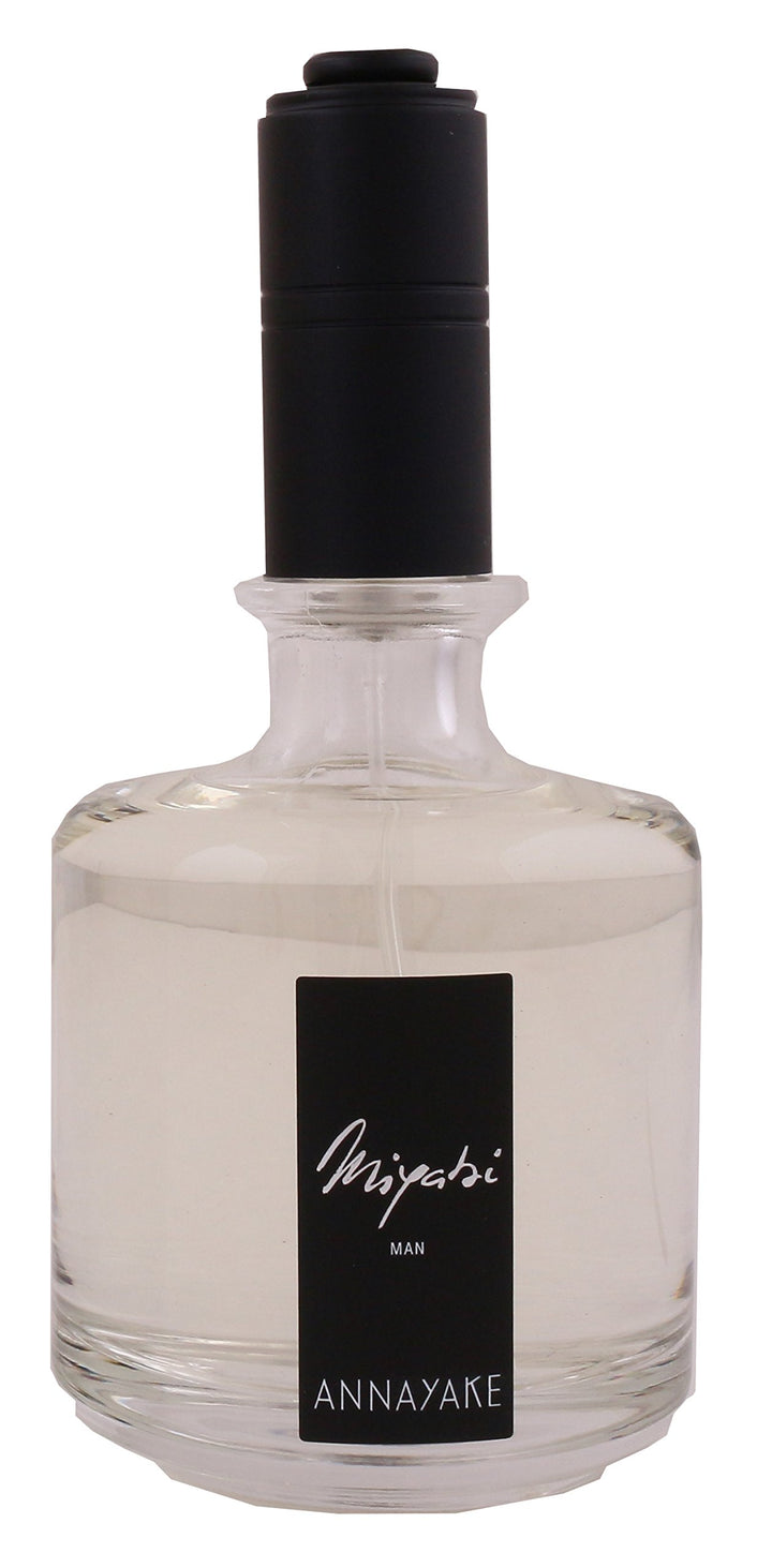 100 ml bottle of sandalwood-spiced Eau de Parfum for Man, amber liquid