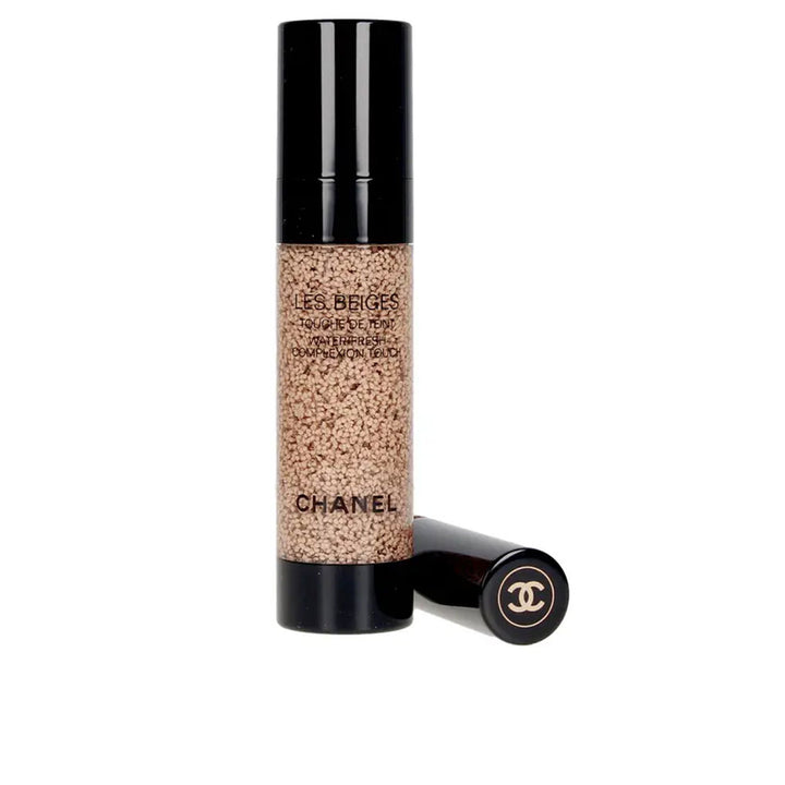 20 ml liquid tinted touch in shade B10 with sponge applicator, dewy finish