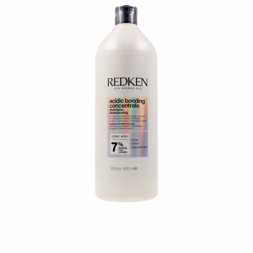 1,000 ml opaque bottle of concentrated bond-repair shampoo for colour-treated hair