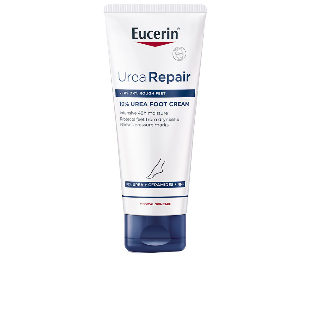 Tube of 100 ml foot cream beside neutral background, labelled 10% urea repair
