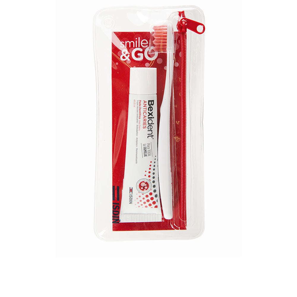 Isdin Compact red and white plastic dental care kit with toothbrush, toothpaste tube, and zip pouch