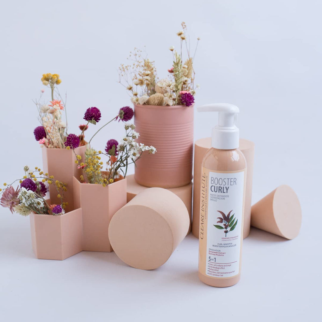 200 ml hydrating curly hair booster bottle; lightweight cream texture