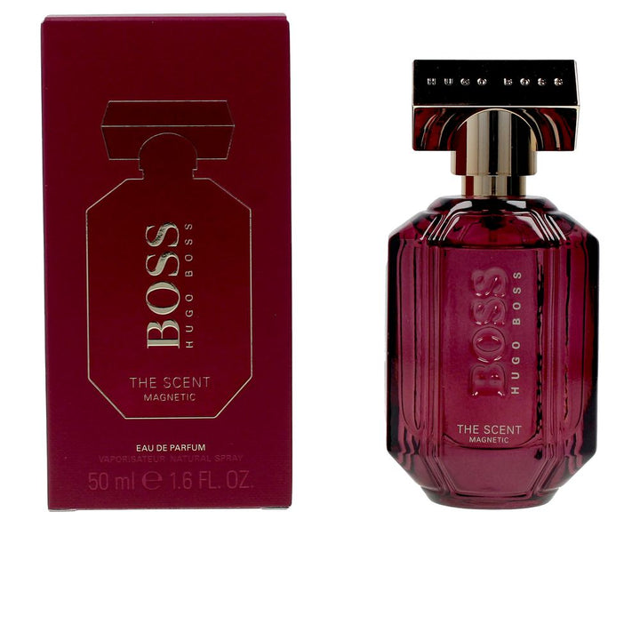 Purple multi‑faceted 50 ml eau de parfum bottle with frosted gold cap