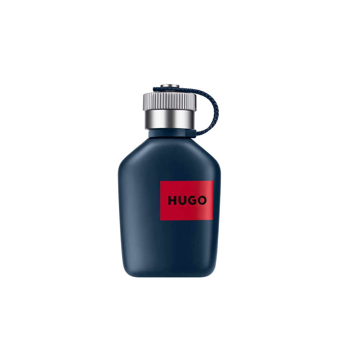 Matte blue 75 ml bottle with textile strap and silver cap; citrus-woody fragrance for Man.