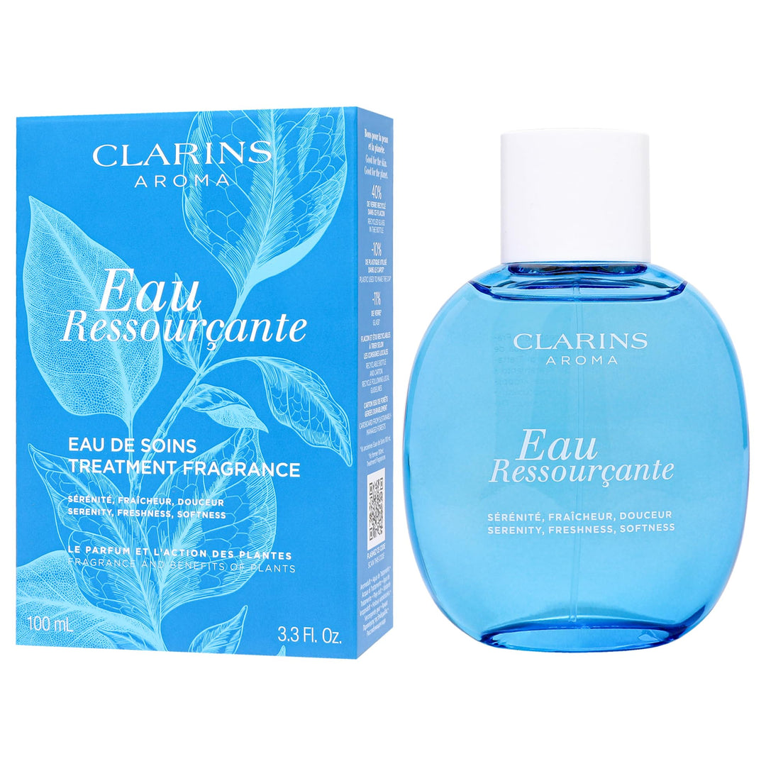 Dark blue elegant perfume bottle labeled Eau Ressourçante, floral-woody fragrance