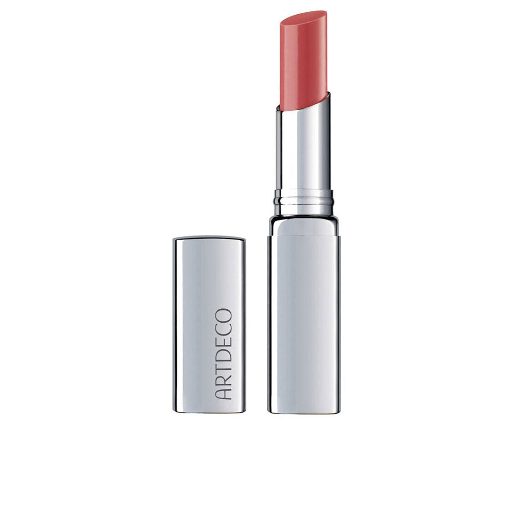 3 g coral tinted lip balm stick in slim tube, glossy finish