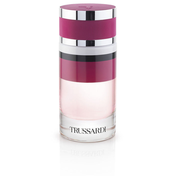 Glass perfume bottle with deep red liquid and silver cap, 90 ml