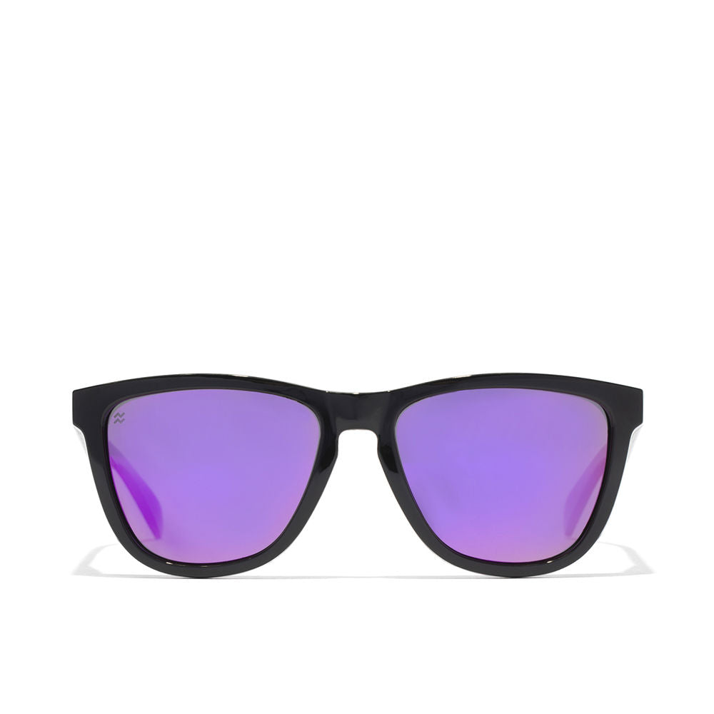 Unisex rectangular black nylon sunglasses with polarised lenses, folded on white background
