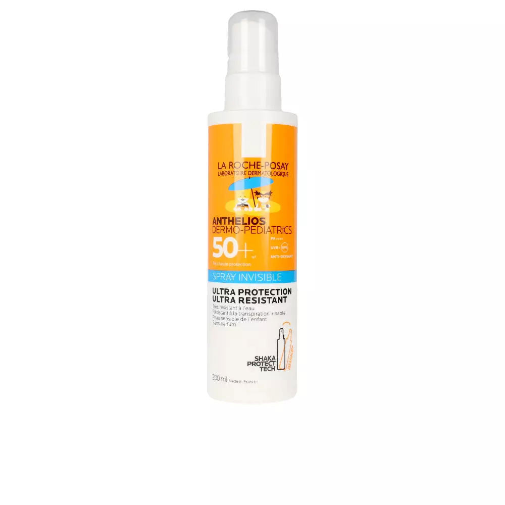 White and orange plastic spray bottle with pump, color-block label, logo, and children-under-umbrella illustration — la Roche Posay