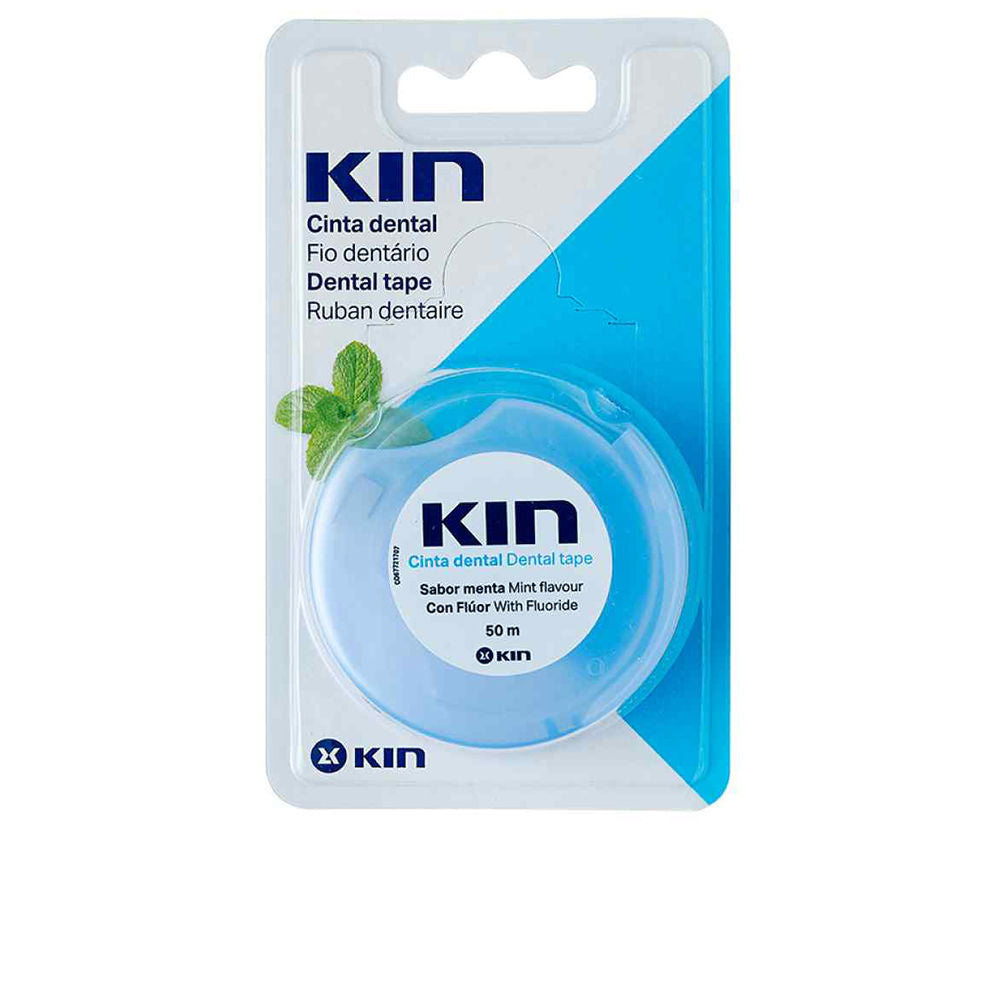 Mint fluoride dental tape on compact spool, ribbon‑style for interproximal cleaning