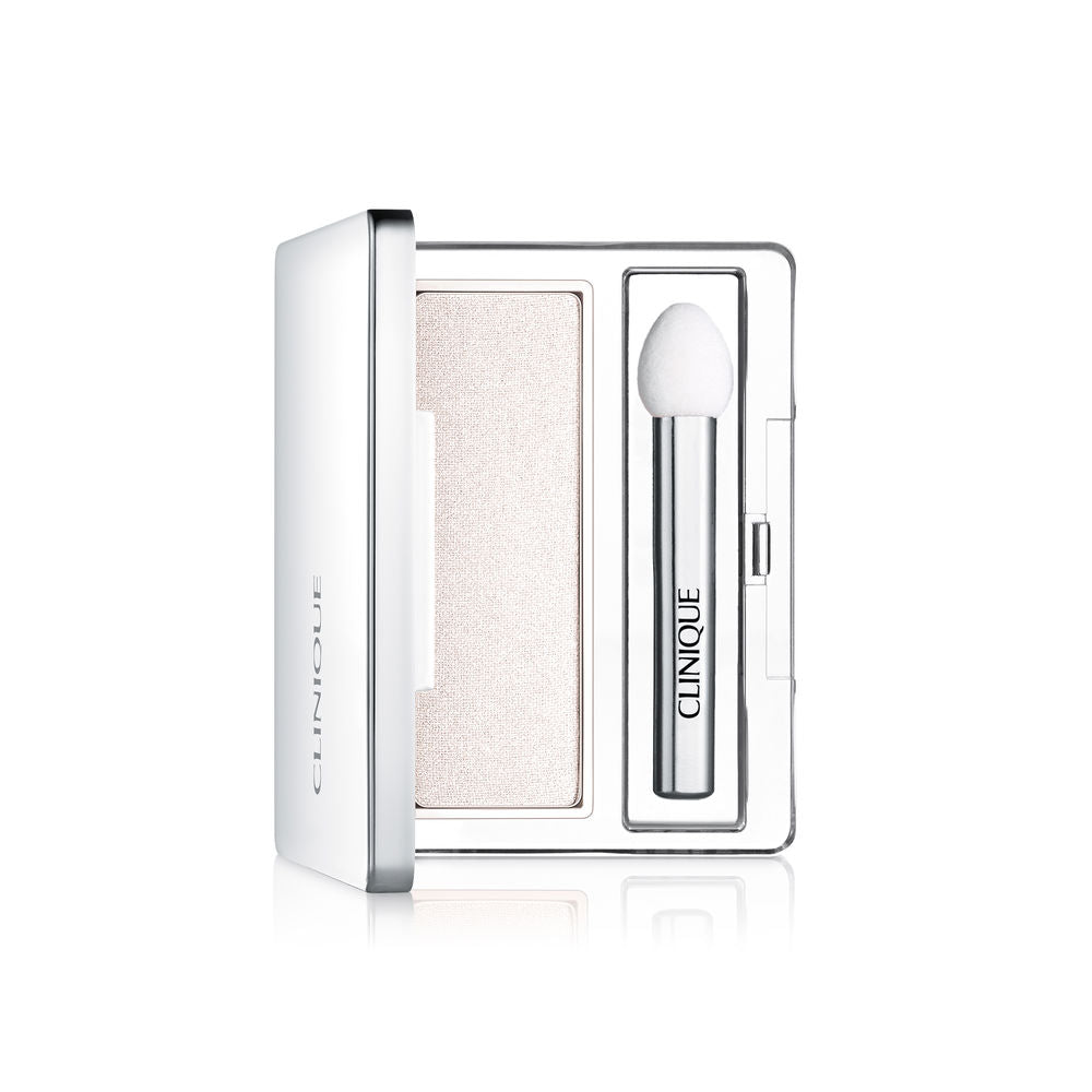 Compact metalised powder eye shadow in pale neutral shade with sponge applicator
