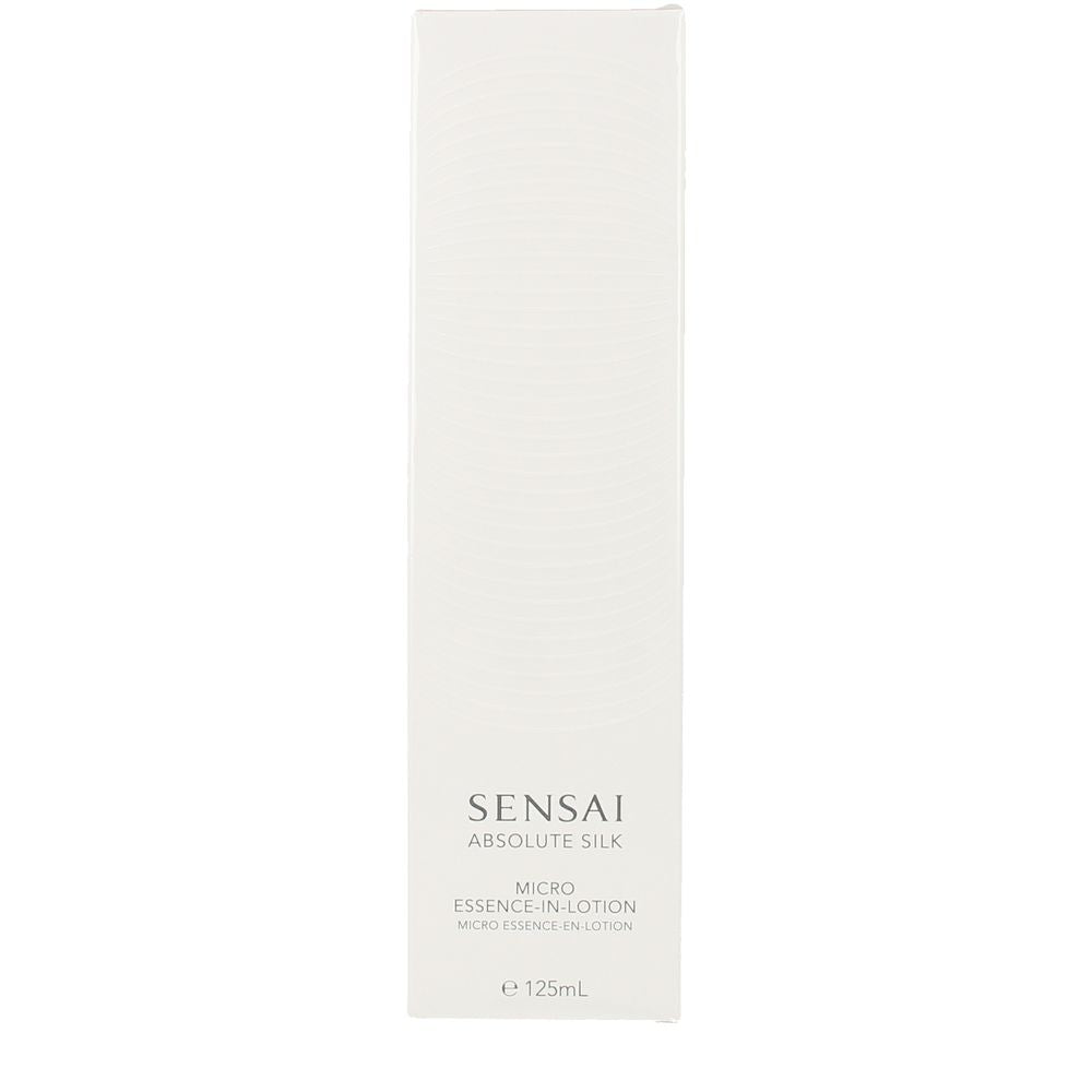 Sensai White minimalist paperboard lotion packaging box photographed flat, crisp edges and subtle embossing