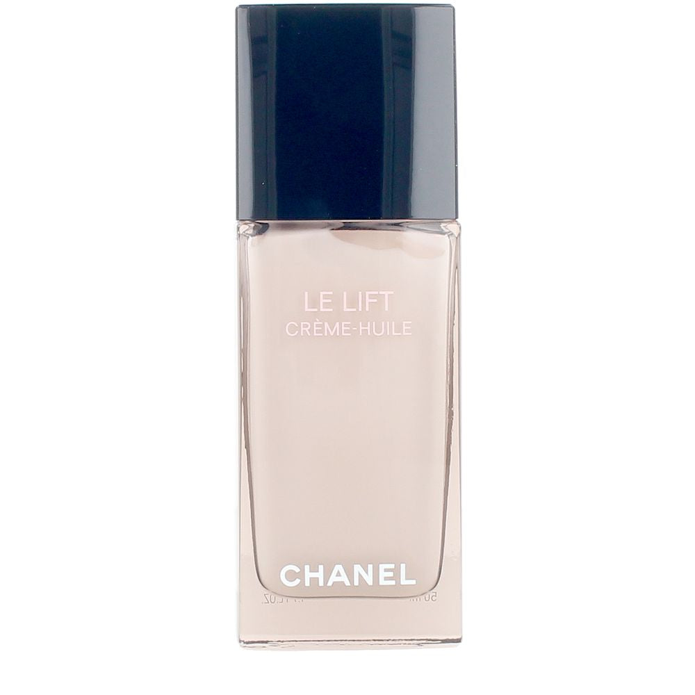 Chanel Beige face cream in transparent rectangular glass bottle with black cap and printed front text