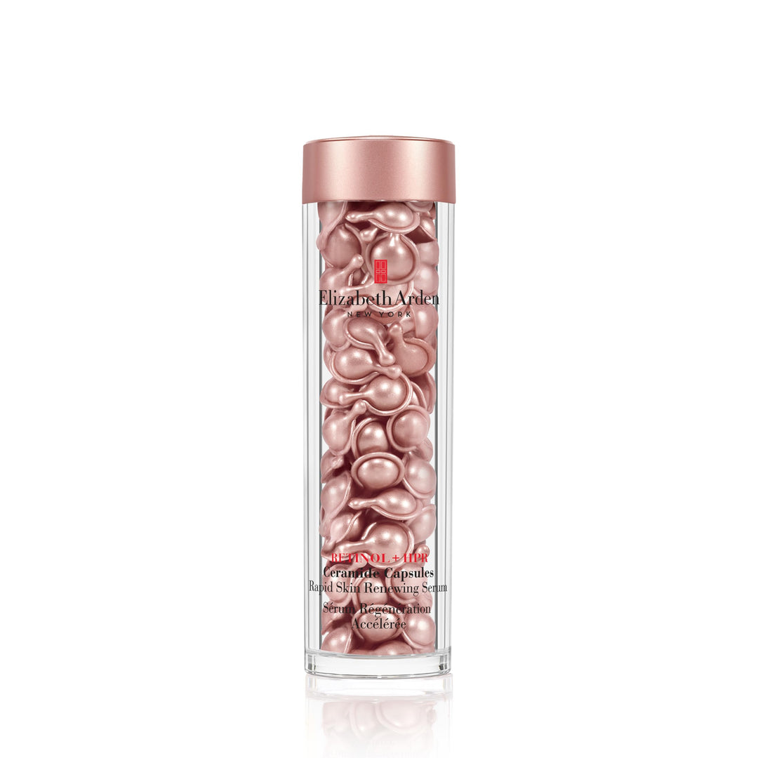 Small amber single‑dose capsules of retinol serum‑gel with translucent gel visible
