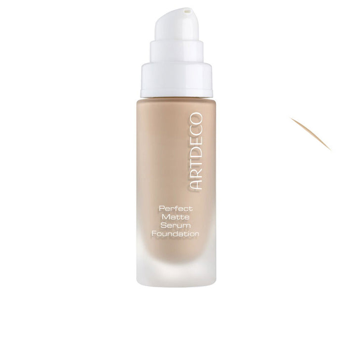 20 ml glass bottle of medium tan liquid foundation with pump, natural matte finish