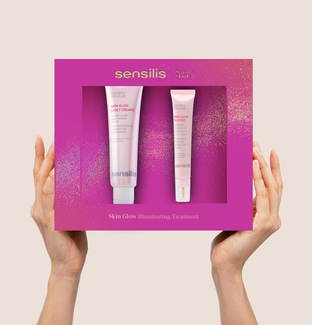 Sensilis Two pink plastic tubes with gold text and glittery packaging, transparent window revealing product names