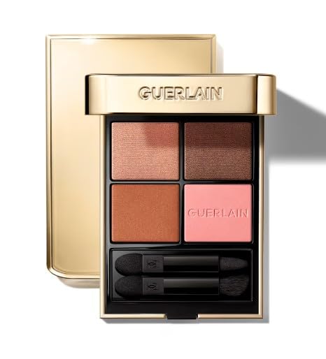 Compact four‑shade eye palette in jewel case with velvet sleeve and applicators