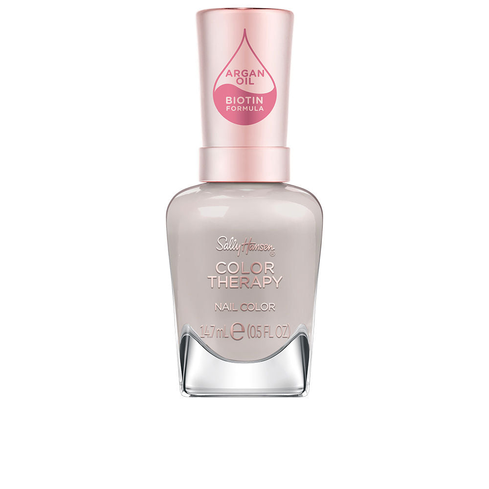 Bottle of beige Serenity Stone nail polish with argan oil, 14.7 ml