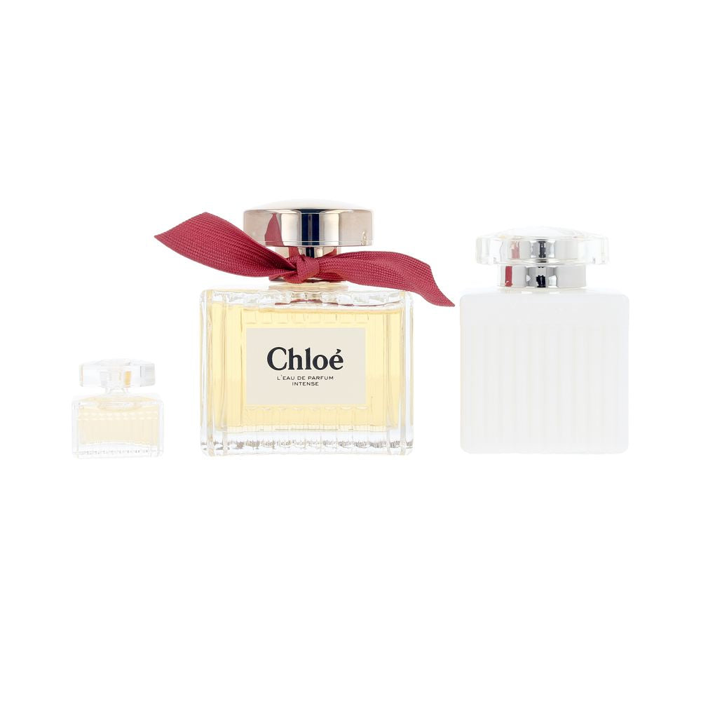 Pleated glass bottle with garnet ribbon and black-crème label, 50 ml perfume