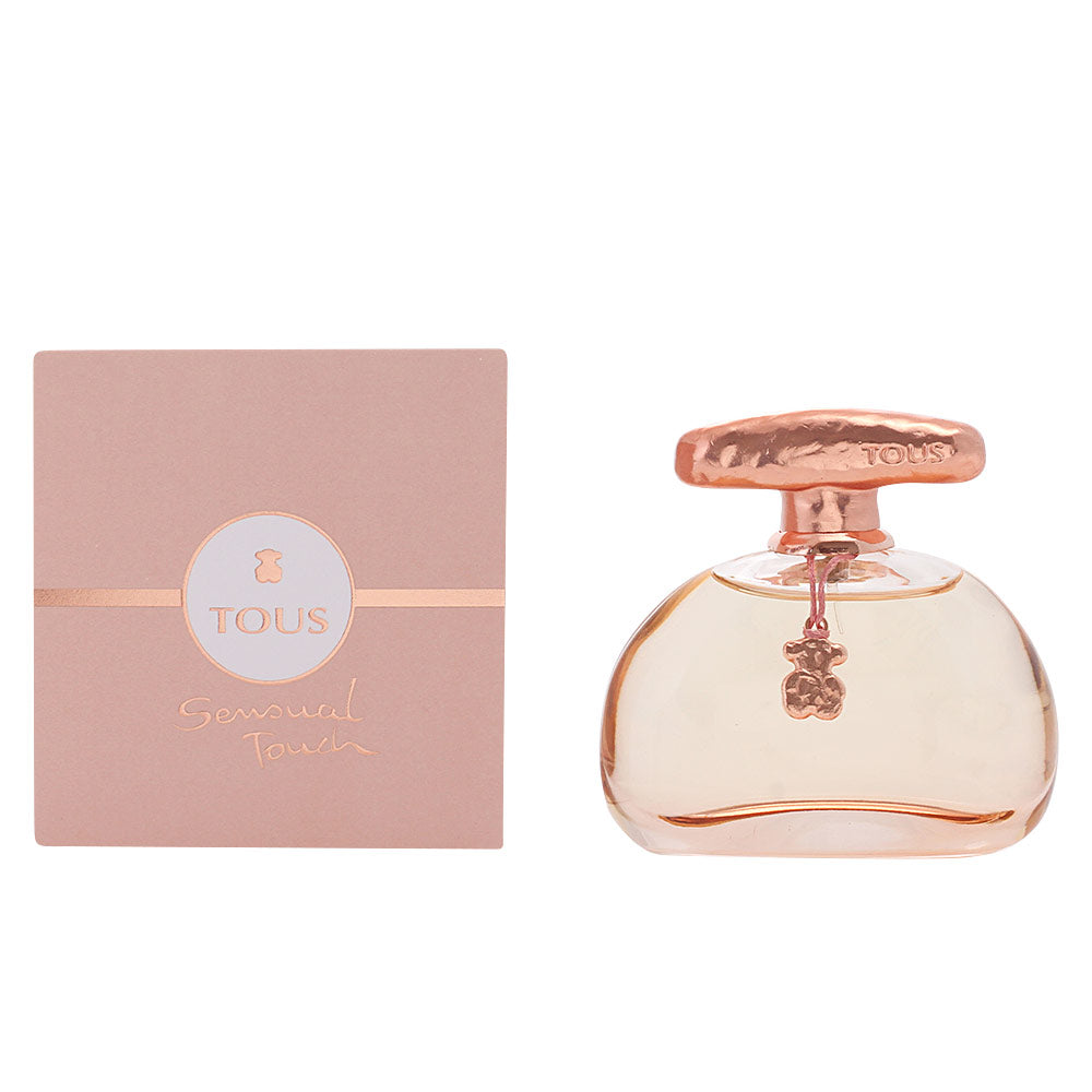 Tous Sensual Touch perfume bottle in soft pink with iconic teddy pendant