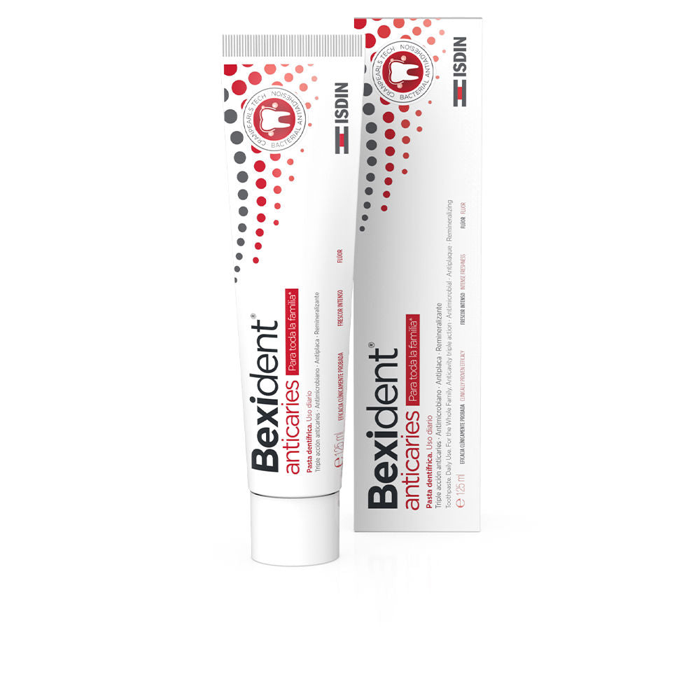White plastic toothpaste tube with red and black accents, dotted pattern and tooth logo, Isdin