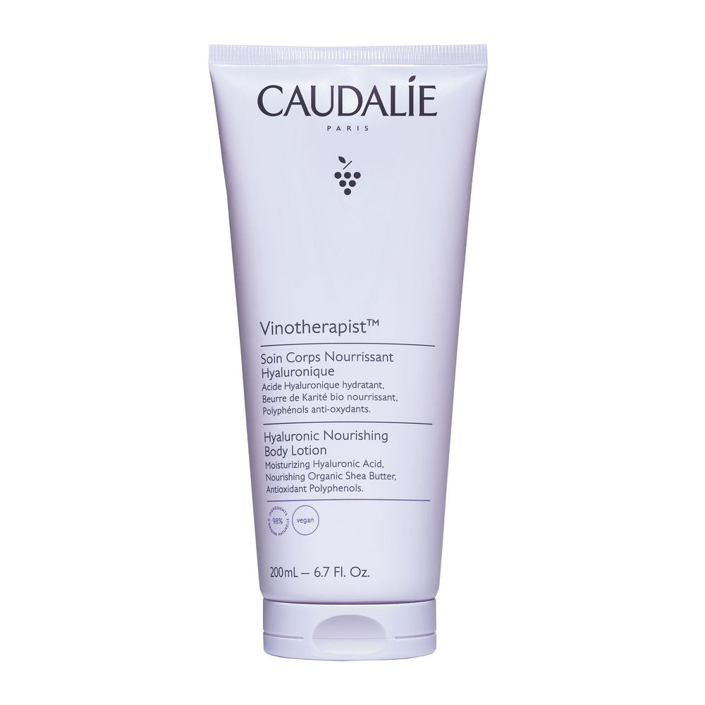 Caudalie Light purple plastic tube with flip-top cap, printed text, grape icon and measurement label
