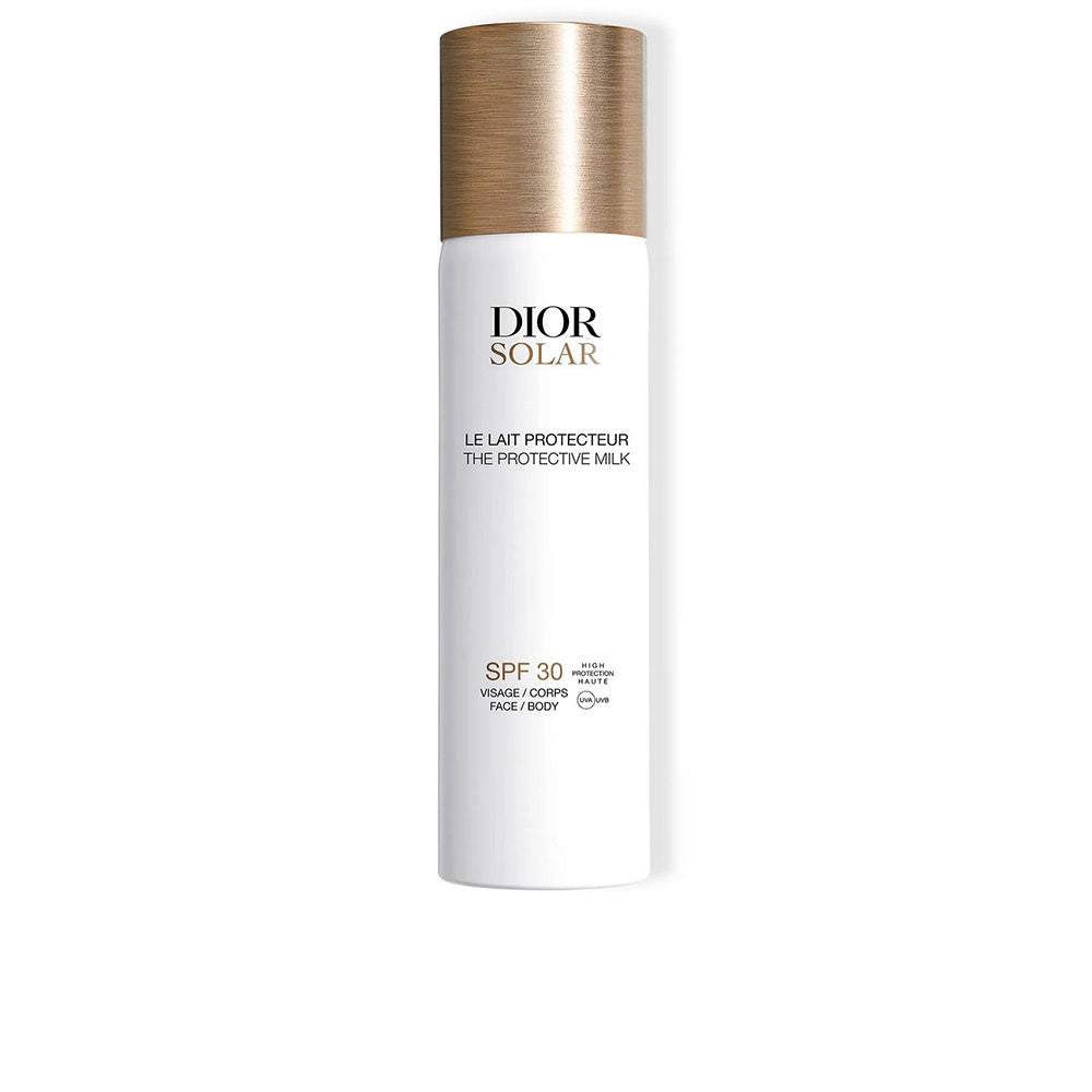 Dior White plastic cylindrical sunscreen lotion bottle with gold textured cap, printed SPF 30 label
