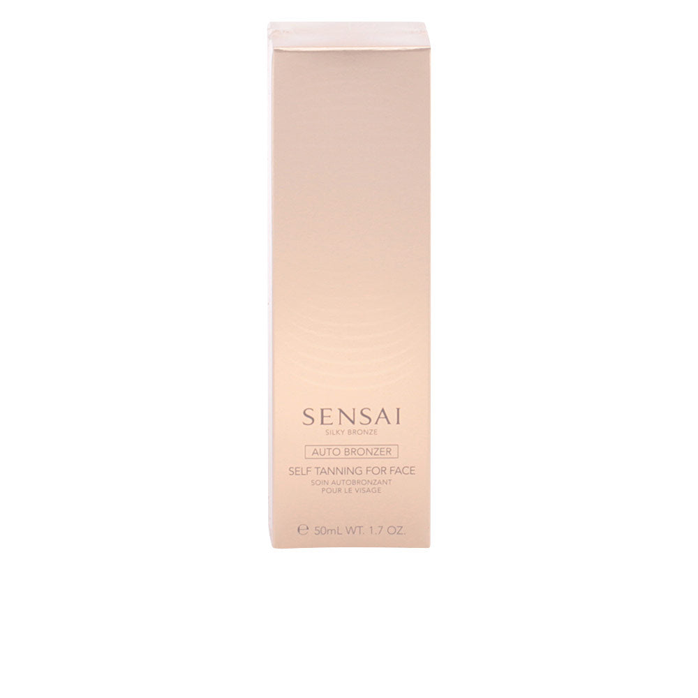 Tub of Sensai facial self-tanning gel with smooth creamy texture on skin