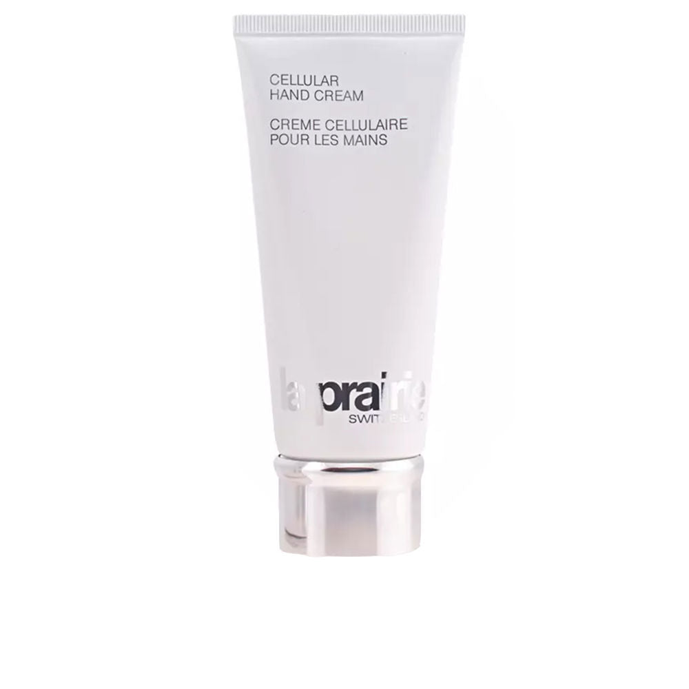 Tube of la Prairie CELLULAR Hand Cream next to hands, minimalist styling