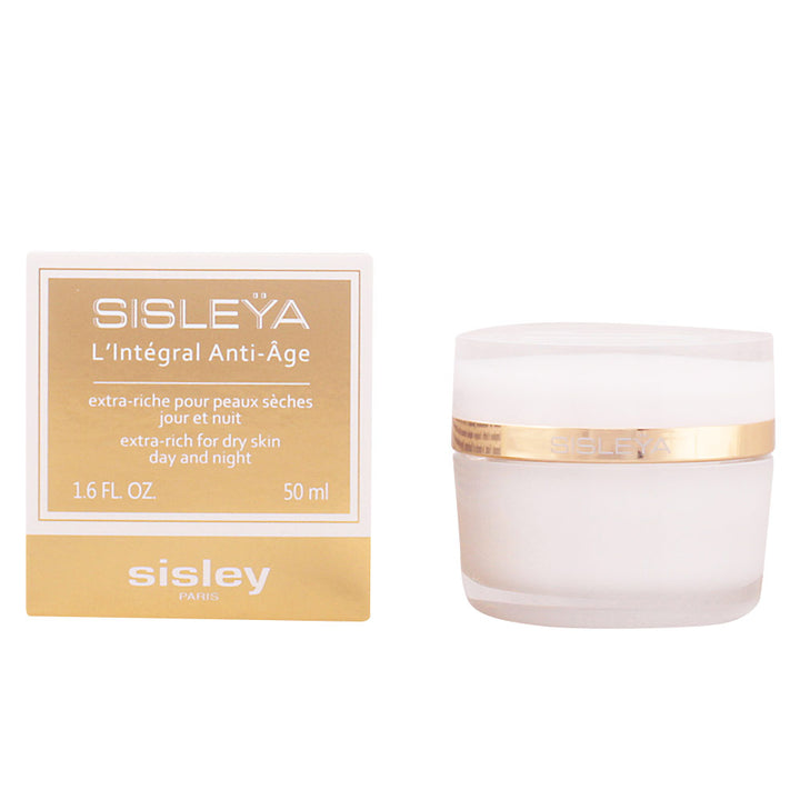 Sisley Frosted glass face cream jar with gold lid band beside square white and gold box, printed text visible