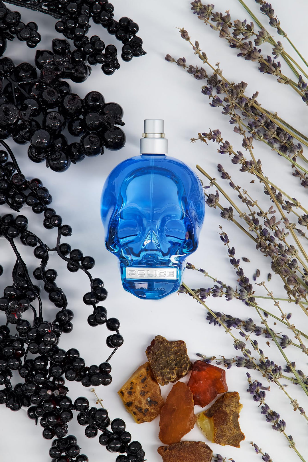 Blue clear glass skull-shaped 75 ml eau de toilette spray for Man
