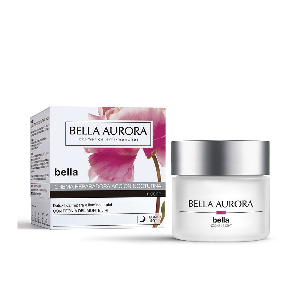 Bella Aurora Frosted glass night balm jar with silver screw cap beside rectangular floral box, white and pink accents