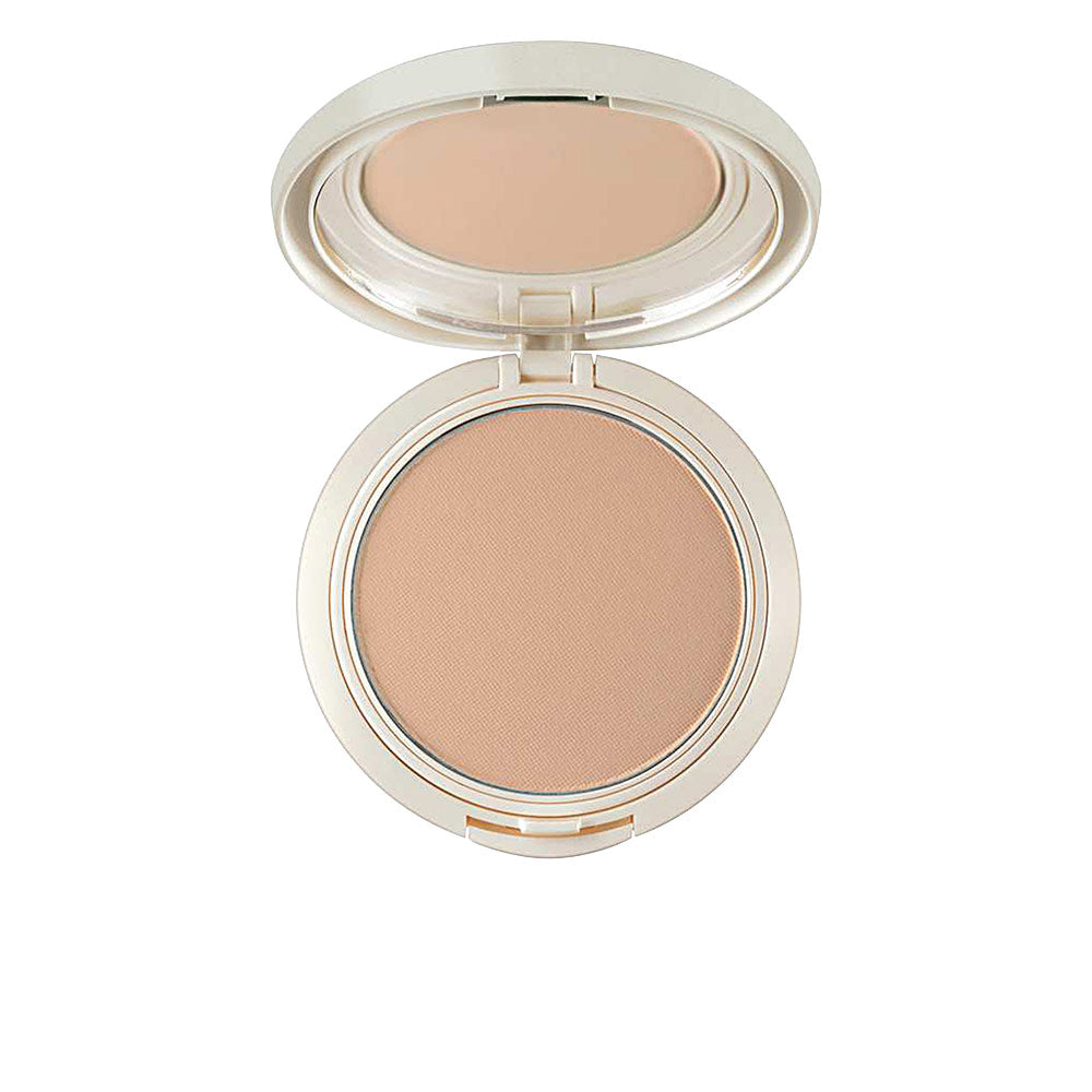 Artdeco Beige round compact powder with hinged plastic case, mirror inside lid, pressed powder texture