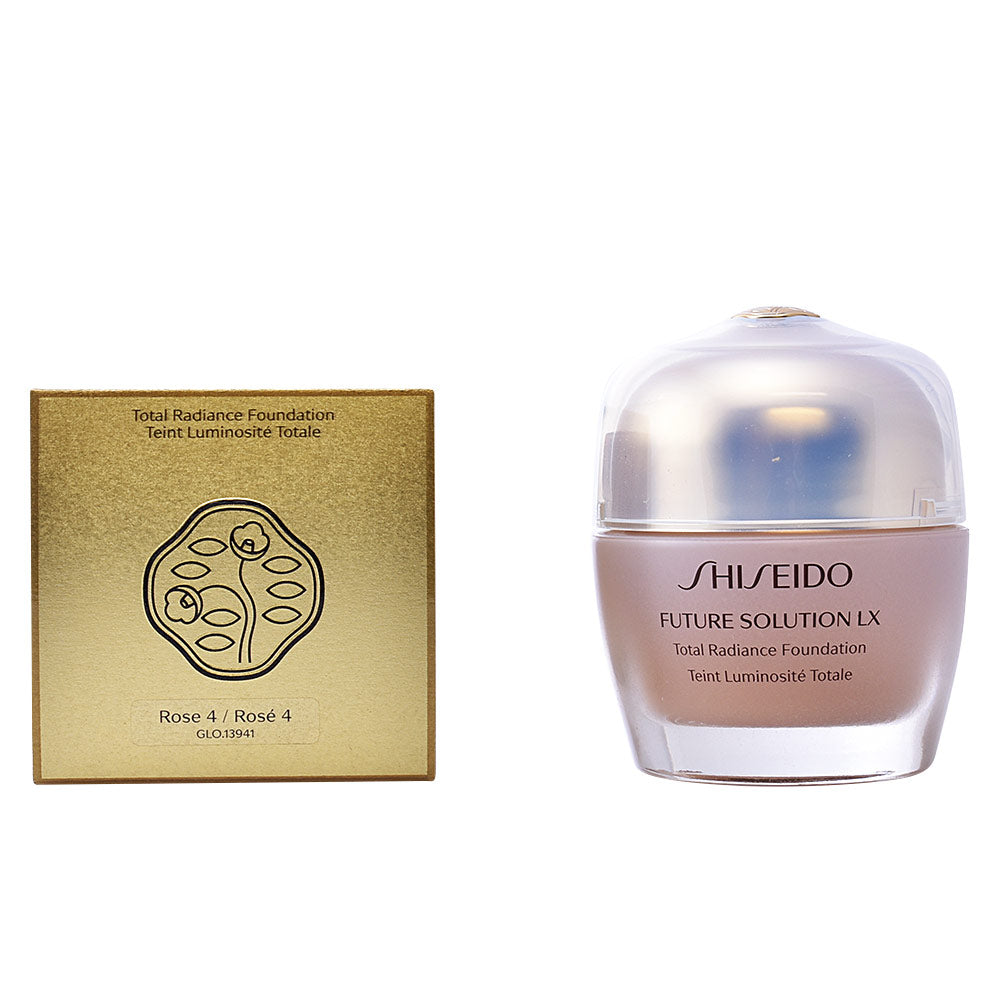 Shiseido Gold and beige foundation jar with lid beside matching box, plastic jar and cardboard box visible