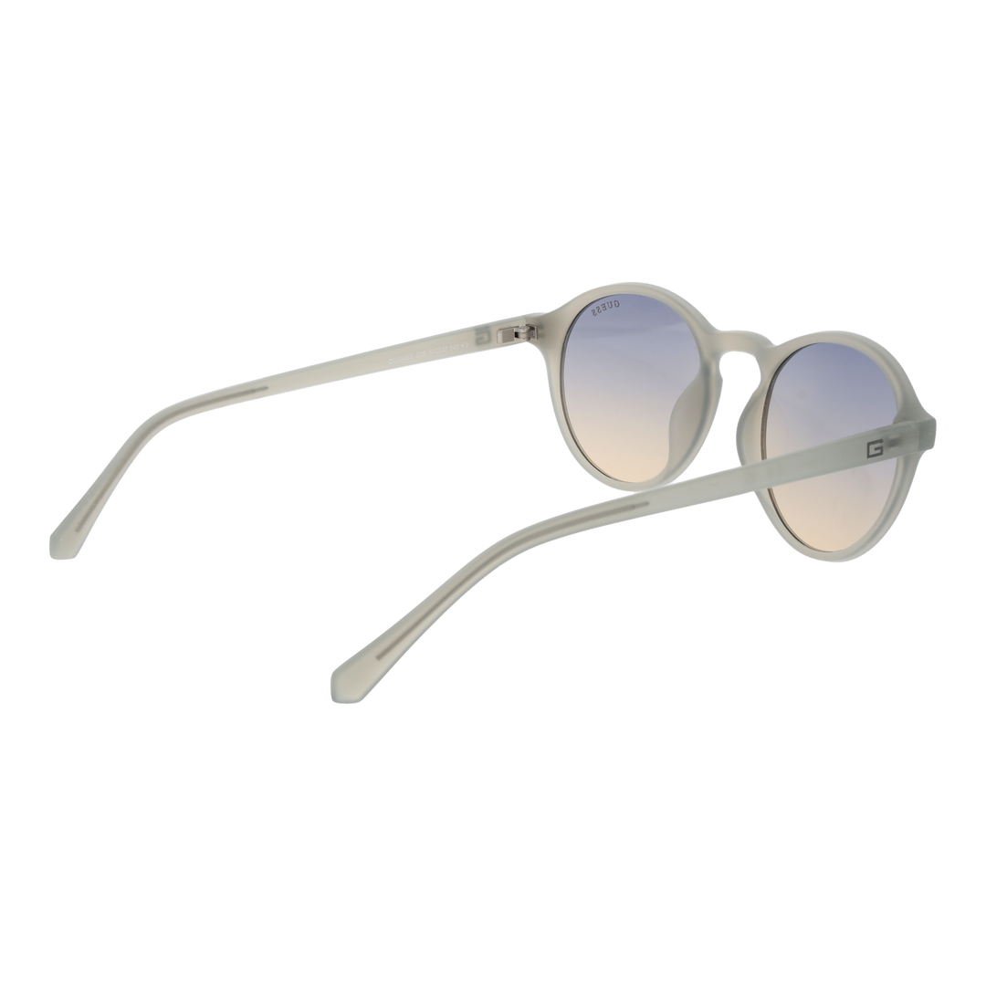 Translucent gray round sunglasses, blue-to-beige gradient lenses, keyhole bridge, plastic frame on white