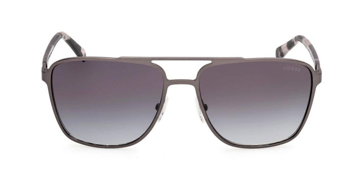 Black metal aviator sunglasses with gradient gray lenses and double bridge, patterned temple tips visible