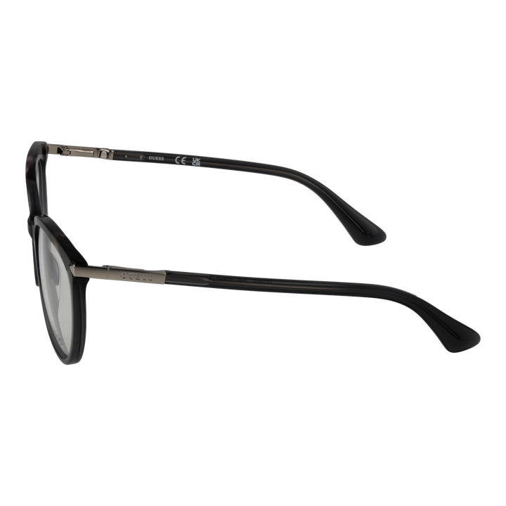 Black tortoiseshell round eyeglasses with metal temple accents and engraved brand detail